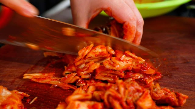 Kimchi and brine in the pot