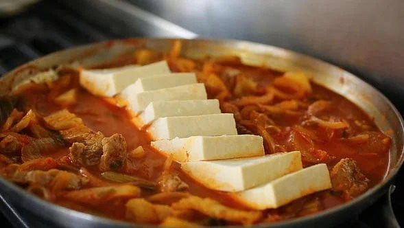 Tofu laid over the stew